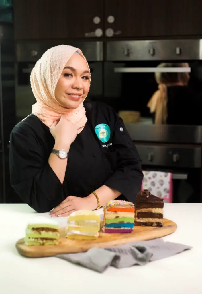 Fateha Abdullah with slices of her popular cakes