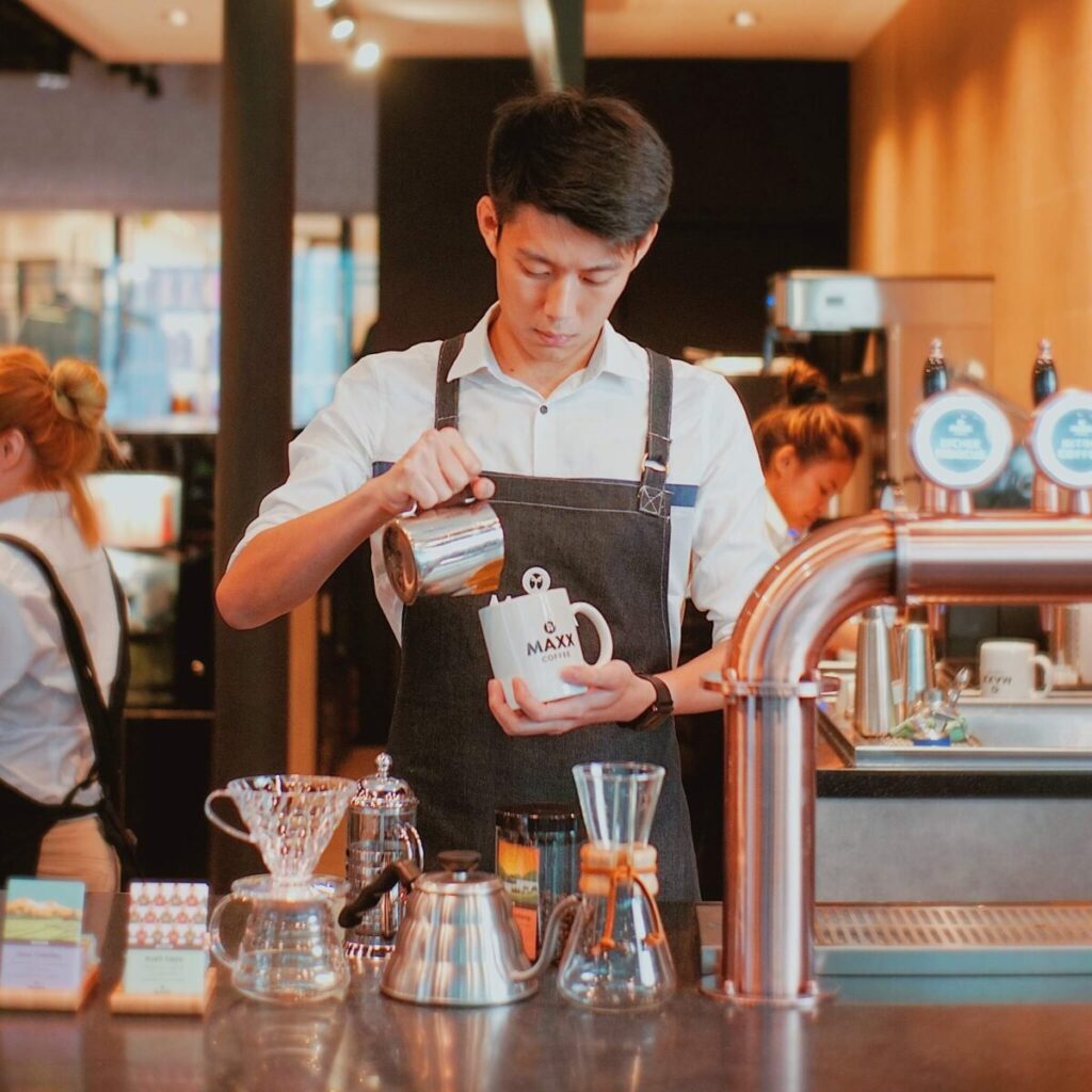 Barista making coffee